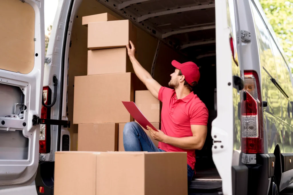 low angle delivery man with package list scaled 1
